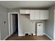 Laundry area with white cabinets and space for washer/dryer at 721 Yale Sw Pl, Atlanta, GA 30315