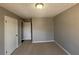 Simple bedroom with neutral walls and carpet at 1435 Winchester Trl, Riverdale, GA 30296