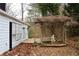 Stone patio with pergola and lattice work, providing a relaxing outdoor space at 2688 Crystal Ln, Lawrenceville, GA 30044