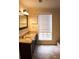 Bathroom with double vanity and granite countertops at 2688 Crystal Ln, Lawrenceville, GA 30044