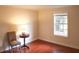 Simple bedroom with hardwood floors and a window at 2688 Crystal Ln, Lawrenceville, GA 30044