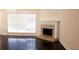 Living room with fireplace and hardwood floors at 2688 Crystal Ln, Lawrenceville, GA 30044