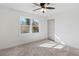 Bright bedroom with neutral walls, plush carpet and a large window at 2756 Lincoln Nw Ct, Atlanta, GA 30318