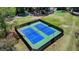 Two well-maintained tennis courts at 123 Maison Nw, Atlanta, GA 30327