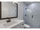 Modern bathroom with marble shower and white vanity at 1258 Prospect Rd, Lawrenceville, GA 30043