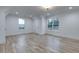 Bright and airy bedroom with hardwood floors and large windows at 1258 Prospect Rd, Lawrenceville, GA 30043