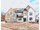 Stunning two-story home with stone and white siding at 1258 Prospect Rd, Lawrenceville, GA 30043