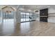 Open concept Gathering room with hardwood floors, fireplace and pool view at 1258 Prospect Rd, Lawrenceville, GA 30043