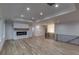 Bright living room featuring hardwood floors and a fireplace at 1258 Prospect Rd, Lawrenceville, GA 30043