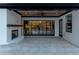 Covered patio with fireplace and large glass doors at 1258 Prospect Rd, Lawrenceville, GA 30043