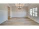 Elegant dining room with chandelier and wainscoting at 138 Frontier Way, Mcdonough, GA 30253