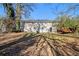 House exterior, backyard view with large trees at 1620 Flintwood Se Dr, Atlanta, GA 30316