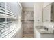 Updated bathroom with a walk-in shower and granite vanity at 1620 Flintwood Se Dr, Atlanta, GA 30316