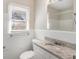 Updated bathroom with granite countertop and white subway tile at 1620 Flintwood Se Dr, Atlanta, GA 30316
