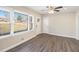 Bright living room featuring large windows and wood-look floors at 1620 Flintwood Se Dr, Atlanta, GA 30316