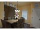 Spacious dining room with hardwood floors and a chandelier at 1180 Hartwell Rd, Locust Grove, GA 30248