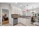 Modern kitchen with stainless steel appliances and granite countertops at 195 Brookhollow Trce, Johns Creek, GA 30022