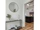 Modern entryway with console table and view into kitchen at 2208 Baker Nw Rd, Atlanta, GA 30318