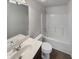 Clean bathroom with tub, shower, toilet and vanity at 607 Stream Ct, Fairburn, GA 30213