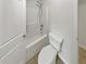 Simple bathroom with a toilet and shower/tub combo at 607 Stream Ct, Fairburn, GA 30213