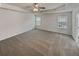 Spacious bedroom with carpet flooring and ceiling fan at 607 Stream Ct, Fairburn, GA 30213