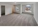 Bedroom with carpet flooring and arched window at 607 Stream Ct, Fairburn, GA 30213