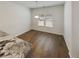 Bright breakfast nook with hardwood floors and large window at 607 Stream Ct, Fairburn, GA 30213