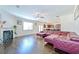 Open living room with hardwood floors and fireplace at 1468 Harlequin Way, Stockbridge, GA 30281