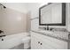 Clean bathroom with a neutral color scheme and granite countertop at 2587 Kingsley Ne Dr, Marietta, GA 30062