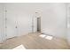Bright bedroom with hardwood floors and double door closet at 2587 Kingsley Ne Dr, Marietta, GA 30062