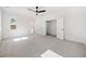 Spacious bedroom featuring ceiling fan and walk-in closet at 2587 Kingsley Ne Dr, Marietta, GA 30062