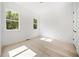 Spacious bedroom with hardwood floors and large windows at 2587 Kingsley Ne Dr, Marietta, GA 30062
