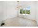 Light-filled dining room with hardwood floors and elegant chandelier at 2587 Kingsley Ne Dr, Marietta, GA 30062