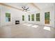 Open living room with hardwood floors, fireplace, and access to a deck at 2587 Kingsley Ne Dr, Marietta, GA 30062