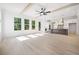 Spacious living room with hardwood floors, high ceilings, and large windows at 2587 Kingsley Ne Dr, Marietta, GA 30062