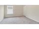 Simple bedroom with carpeted floor and one window at 348 Layfield Dr, Jonesboro, GA 30238