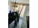 Bright dining room features a chandelier and large window at 815 Dogwood Trl, Jonesboro, GA 30238