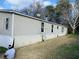 Tan mobile home with satellite dish at 815 Dogwood Trl, Jonesboro, GA 30238