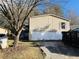 Tan mobile home with large yard at 815 Dogwood Trl, Jonesboro, GA 30238