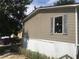 Tan mobile home with white skirting at 815 Dogwood Trl, Jonesboro, GA 30238