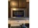 Stainless steel microwave above the white range at 815 Dogwood Trl, Jonesboro, GA 30238