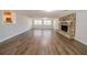 Large finished basement with a stone fireplace and lots of natural light at 1471 Midview Dr, Decatur, GA 30032