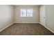 Bright bedroom with neutral walls and carpet at 1471 Midview Dr, Decatur, GA 30032