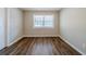 Bright bedroom with neutral walls and wood floors at 1471 Midview Dr, Decatur, GA 30032