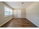 Spacious bedroom with hardwood floors and neutral walls at 1471 Midview Dr, Decatur, GA 30032