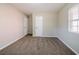Simple bedroom with neutral walls and carpet at 1471 Midview Dr, Decatur, GA 30032
