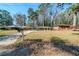 Ranch style home with a spacious yard and driveway at 1471 Midview Dr, Decatur, GA 30032