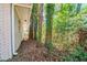 Side yard with mature trees and privacy at 1471 Midview Dr, Decatur, GA 30032