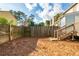 Backyard with wooden fence and pine straw at 293 Juliet Sw Ln, Marietta, GA 30008