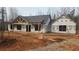 Newly constructed craftsman style home with covered porch at 331 Morgan Rd, Temple, GA 30179